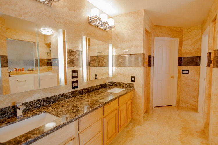 Mesa, AZ bathroom remodeling contractor featuring Forza Stone panels, accessible shower and a walk-in tub.