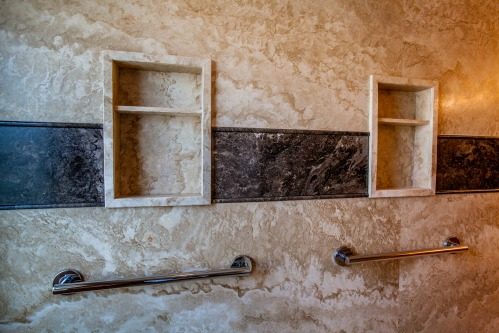 Master bathroom addition in Phoenix, Arizona -  featuring Forza Stone panels, an accessible shower and a walk-in jetted tub.