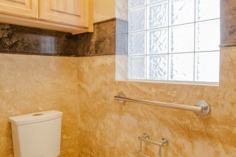 Mesa, AZ bathroom remodeling contractor featuring Forza Stone panels, accessible shower and a walk-in tub.