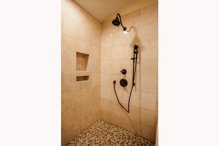 Phoenix Bathroom Remodeling Contractor. Luxurious master bathroom remodel with a large tile shower and soaking tub.