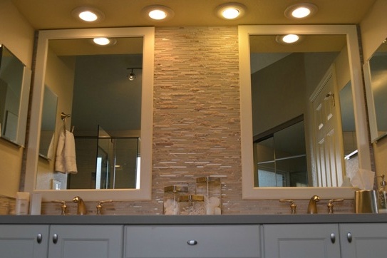 Paradise Valley bathroom remodeling contractor. Master bathroom remodel with a large soaking tub, glass shower surround, stacked stone backsplash.