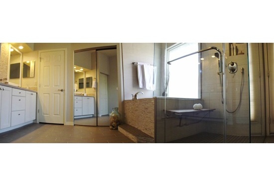 Paradise Valley bathroom remodeling contractor. Master bathroom remodel with a large soaking tub, glass shower surround, stacked stone backsplash.