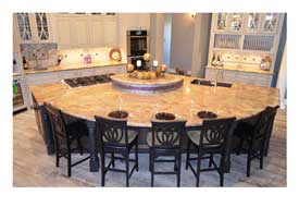 Chandler AZ open concept kitchen remodel with custom gray cabinetry and seating at a large island.