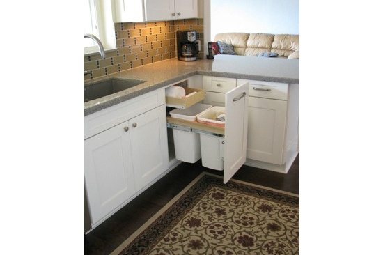 Kitchen Remodeling Contractor in Phoenix, AZ. Open concept galley kitchen renovation with gray quartz counter tops and white cabinets.