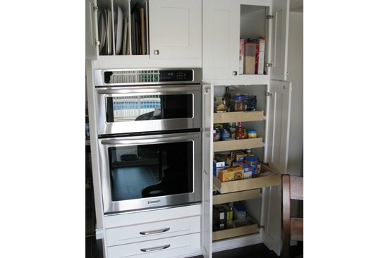 Mesa, AZ kitchen remodeling contractor. Open concept galley kitchen with gray quartz counter tops and white cabinets.