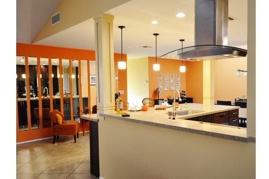Scottsdale, AZ Kitchen remodeling Contractor featuring peninsula seating, columns and pendant lighting.